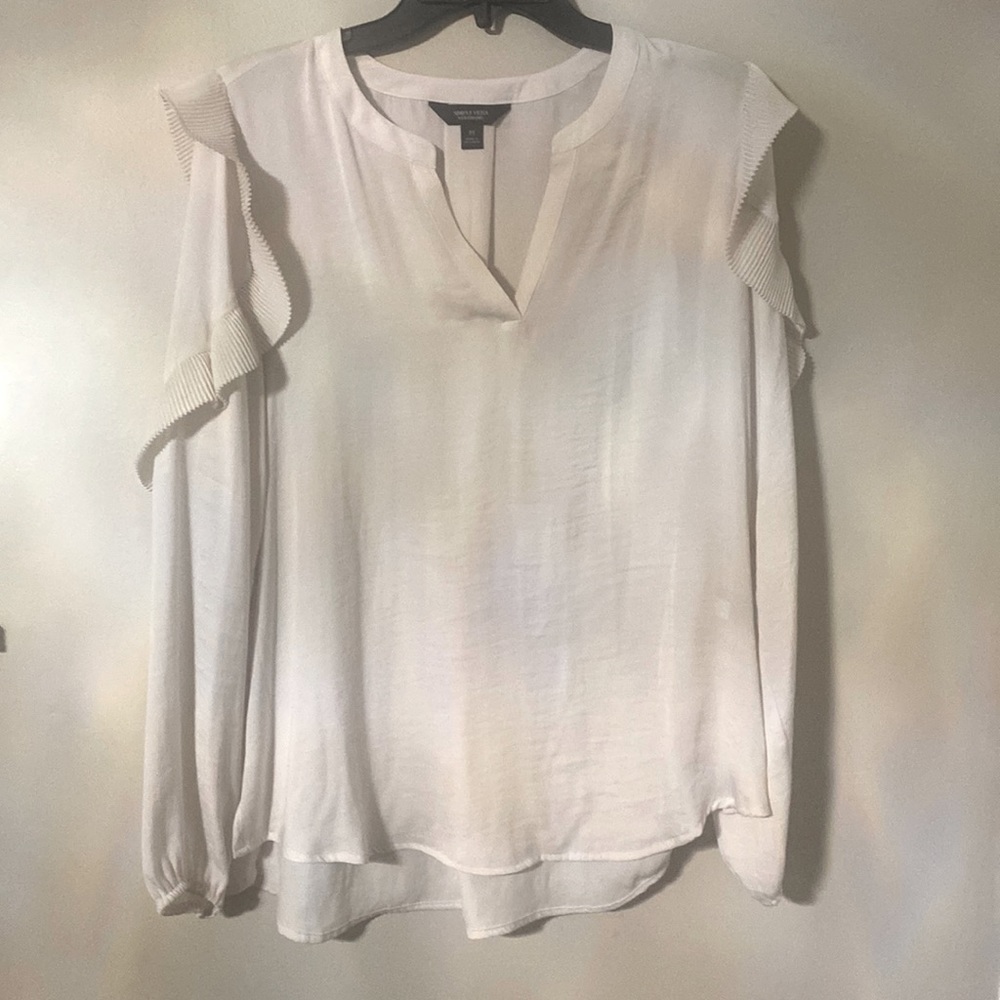 White ruffled Vera Wang blouse.